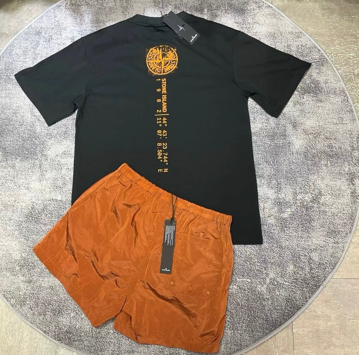 Ensemble stone island orange et noir