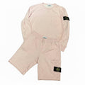 Ensenble pull et short stone island saumon